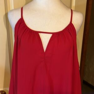 Cold shoulder V front thin straps longer tail 
NEVER WORN